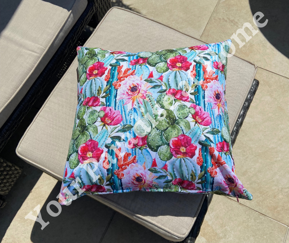 Outdoor weatherproof cushion, in a vibrant cactus design print.