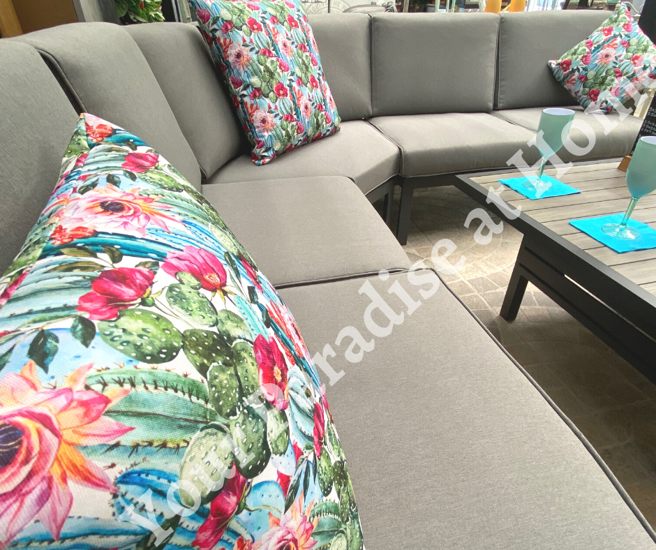 Outdoor weatherproof cushion, in a vibrant cactus design print.