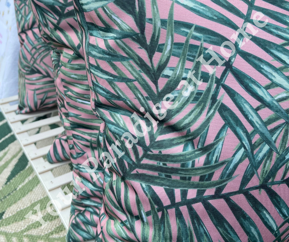 Palm leaves on blush pink background outdoor cushion for your garden. Weatherproof fabric is water resistant and UV resistant. Cushion covers are zipped and washable.