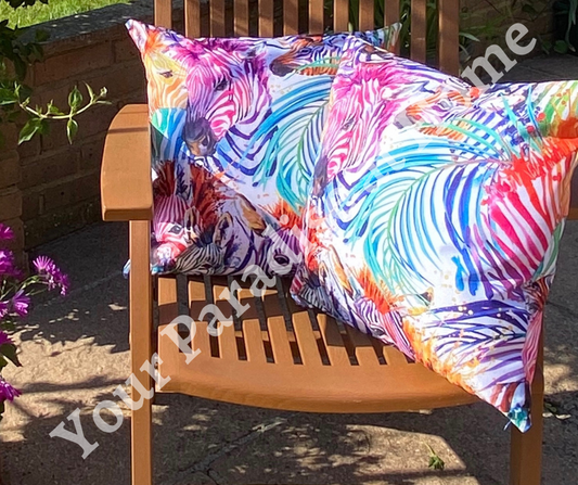 Rainbow zebras outdoor cushion for your garden. Weatherproof fabric is water resistant and UV resistant. Cushion covers are zipped and washable