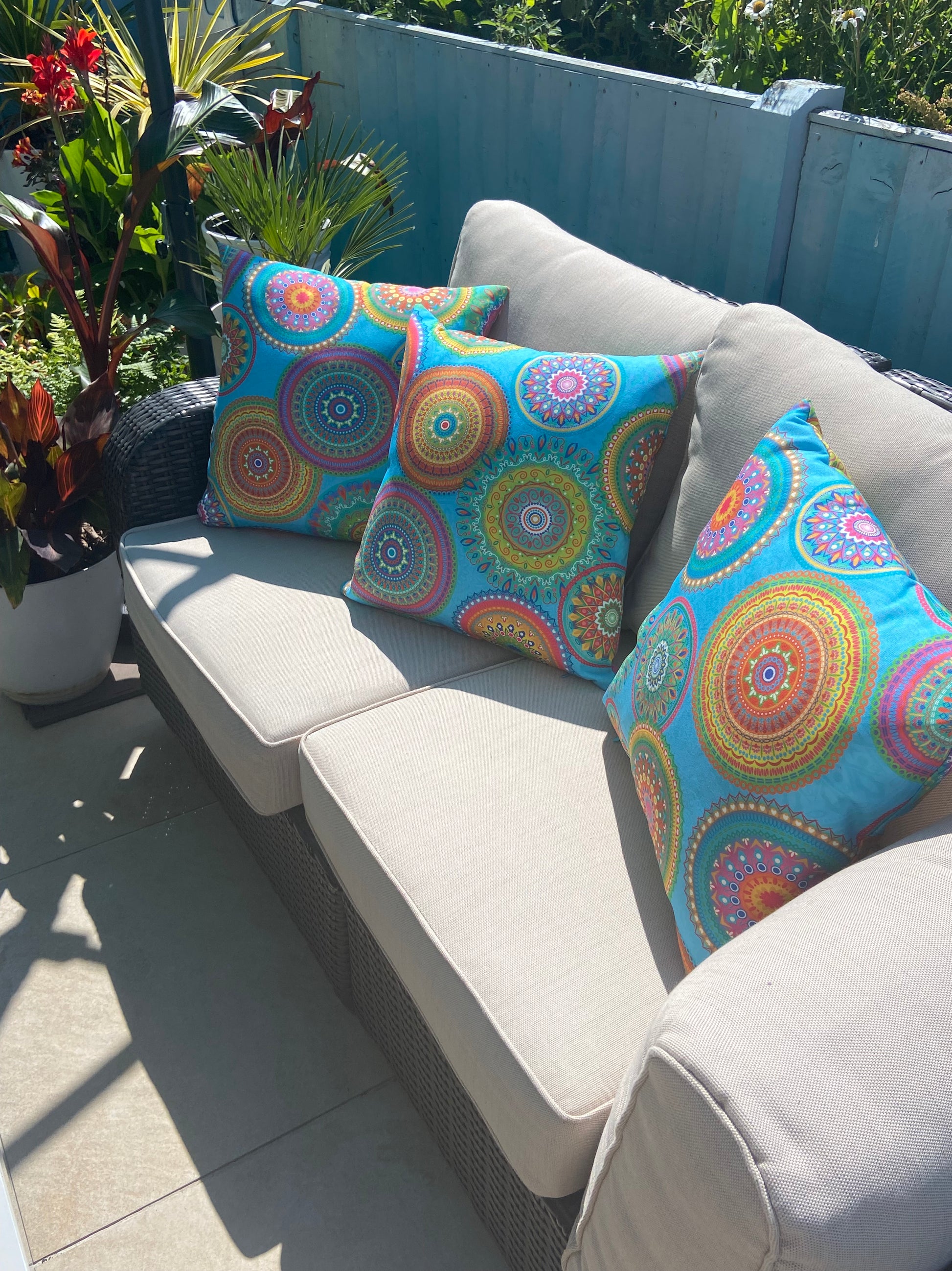 Turquoise Mandalas outdoor cushion for your garden to add vibrant colours. Weatherproof fabric is water resistant and UV resistant. Cushion covers are zipped and washable.