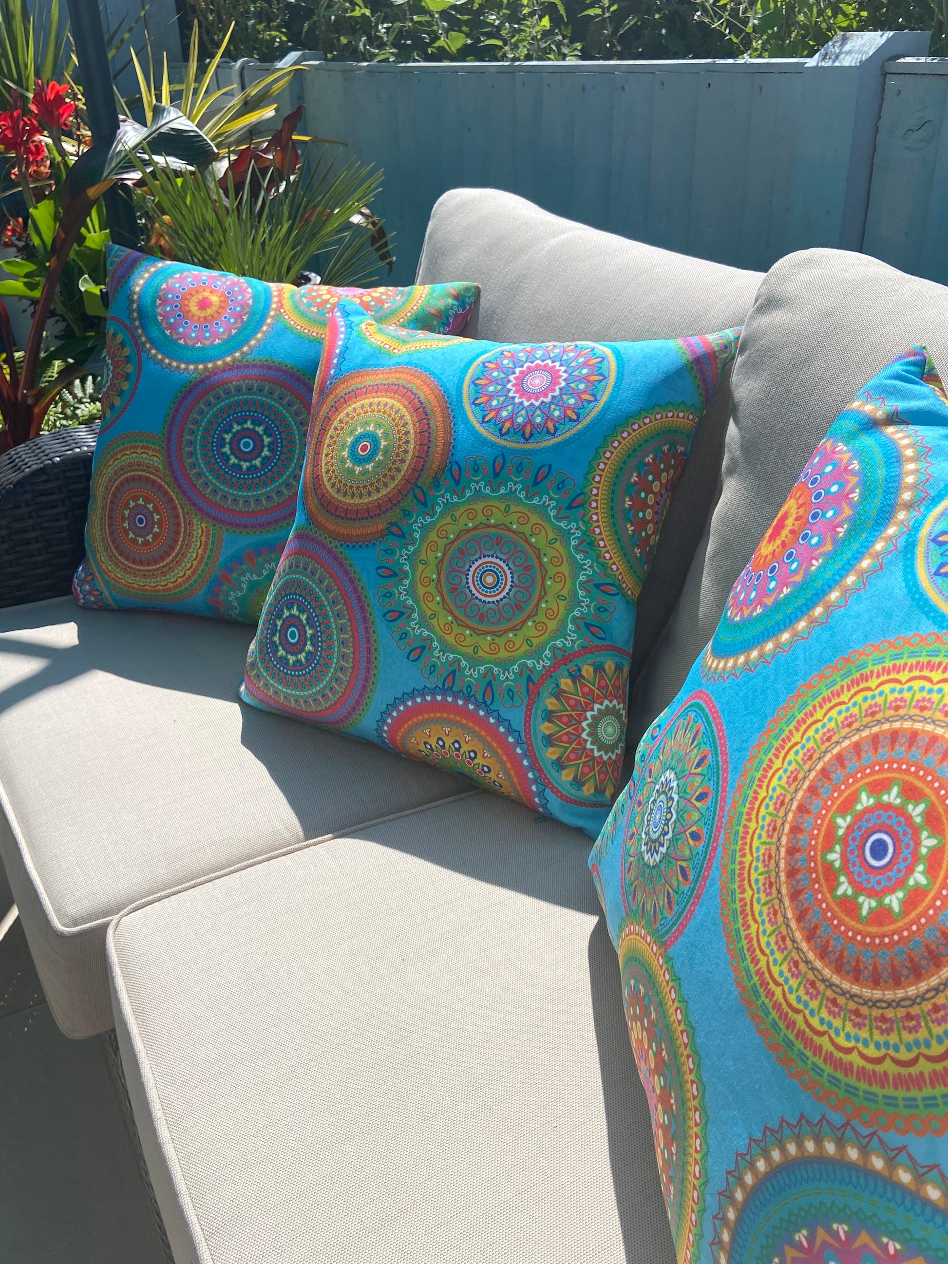 Turquoise Mandalas outdoor cushion for your garden to add vibrant colours. Weatherproof fabric is water resistant and UV resistant. Cushion covers are zipped and washable.