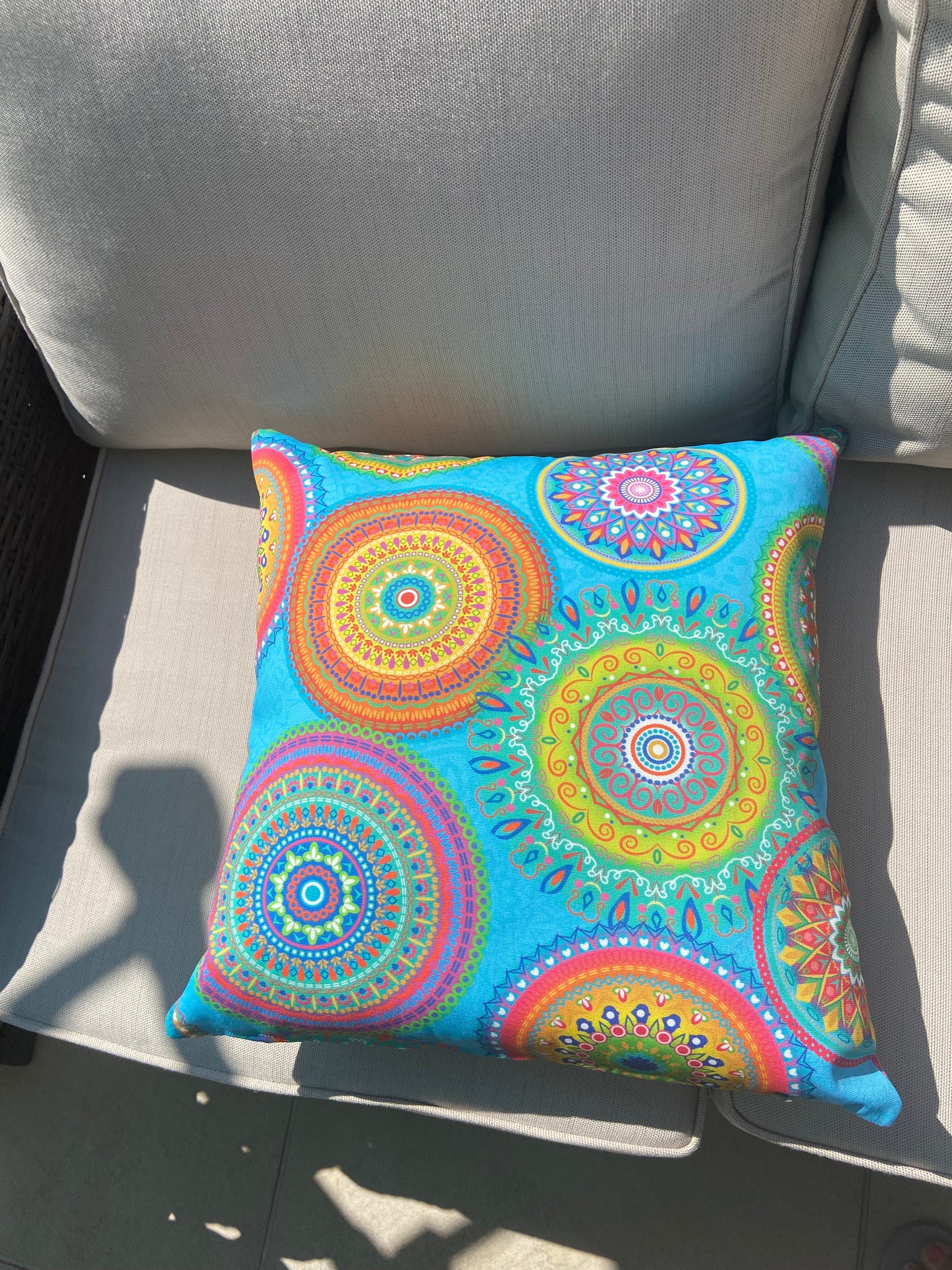 Turquoise Mandalas outdoor cushion for your garden to add vibrant colours. Weatherproof fabric is water resistant and UV resistant. Cushion covers are zipped and washable.