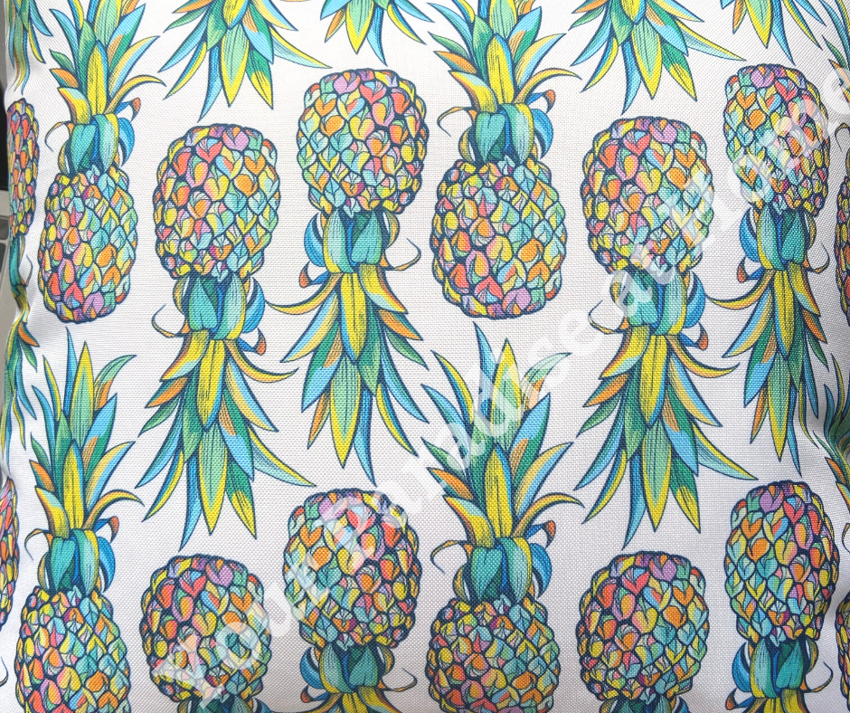 Rainbow pineapples outdoor cushion for your garden. Weatherproof fabric is water resistant and UV resistant. Cushion covers are zipped and washable